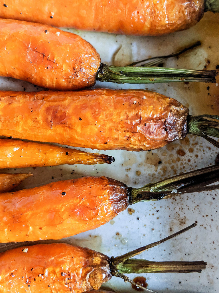 Roasted Carrots with ShortHive Chilli (Spicy) Habanero Infused Australian Honey bottle.